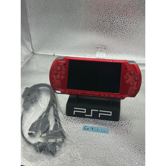 Red psp 3000 w/charger & new battery - Picture 1 of 8